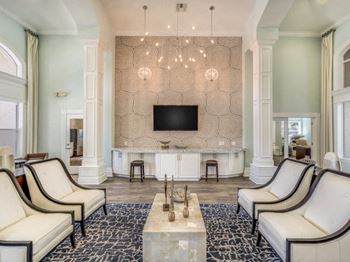 Office lobby seating area with tv